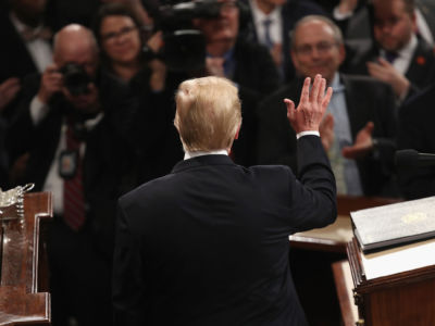 President Trump waves to the audience ahead of the State of the Union address
