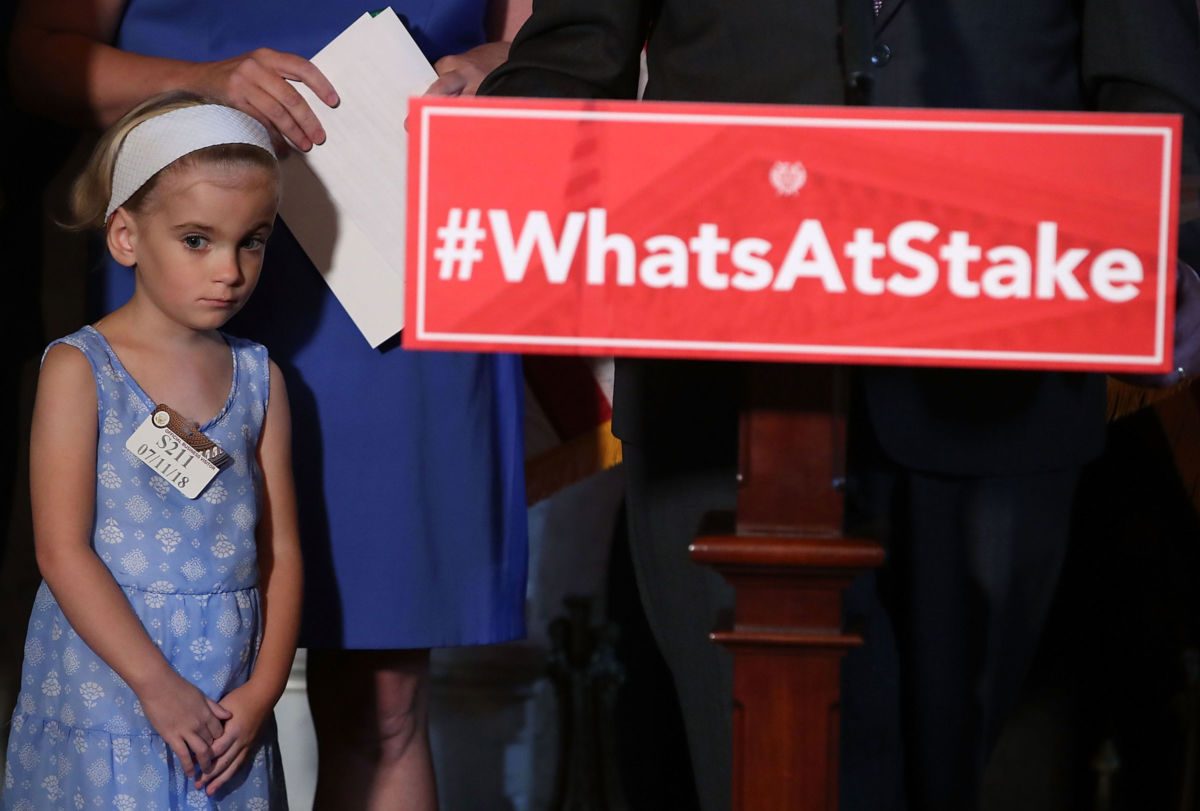 Six-year-old Charlie Wood, who has complex medical needs from being born three months early, attends a news conference about health care on Capitol Hill, on July 11, 2018, in Washington, D.C.