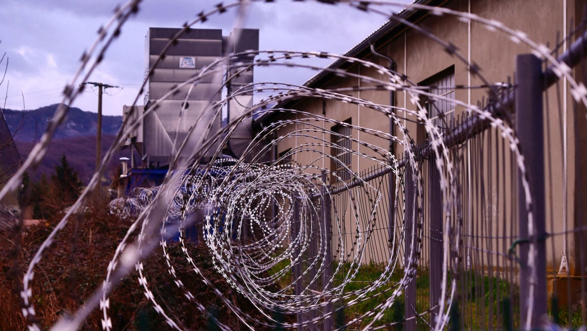 Razor wire fence outside of a prison