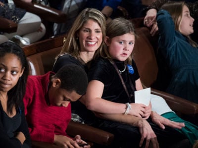 Rep. Lori Trahan (D-Massachusetts) and her daughter are seen in the Capitol's House chamber before members were sworn in on the first day of the 116th Congress on January 3, 2019.