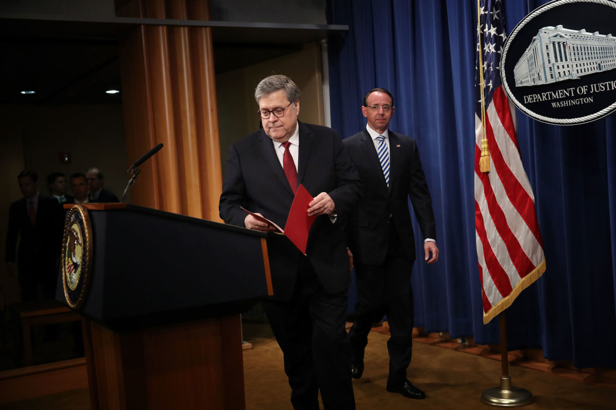 Attorney General William Barr (L) arrives for a press conference on the release of the redacted version of the Mueller report at the Department of Justice April 18, 2019, in Washington, D.C.