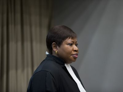 Fatou Bensouda looks onward in a gray room