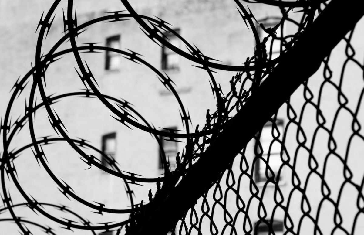 Razor wire fence outside prison