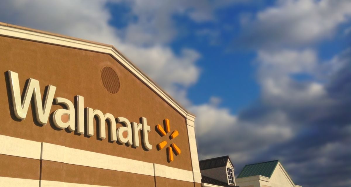 A photo of the Walmart logo on the Walmart building