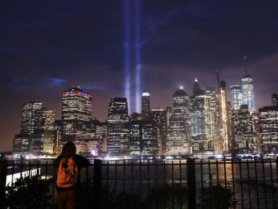 The 'Tribute in Light' memorial lights up lower Manhattan near One World Trade Center on September 11, 2018, in New York City.