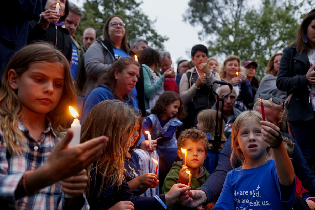 Community members and congregants attend a candlelight vigil for the victim of the Chabad of Poway Synagogue shooting on April 28, 2019, in Poway, California.