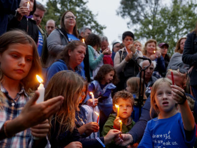 Community members and congregants attend a candlelight vigil for the victim of the Chabad of Poway Synagogue shooting on April 28, 2019, in Poway, California.