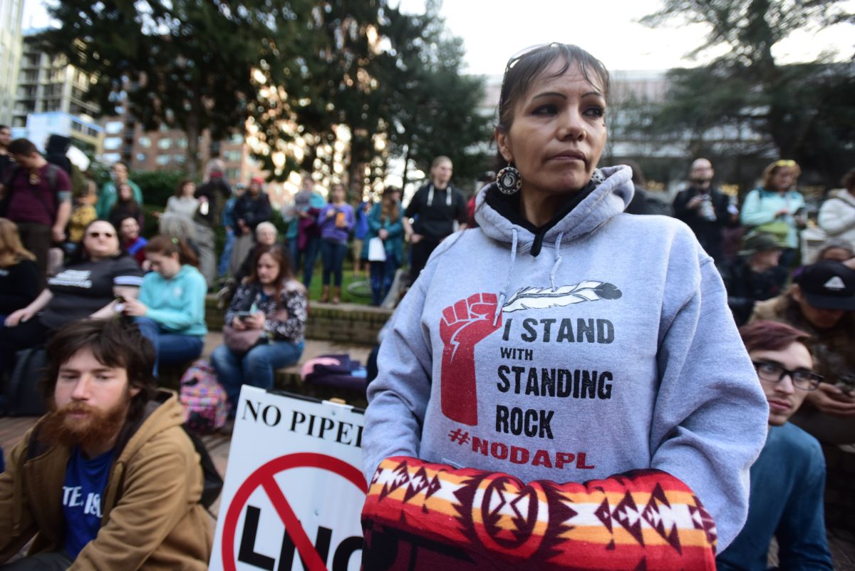 A Native American woman takes part in a protest