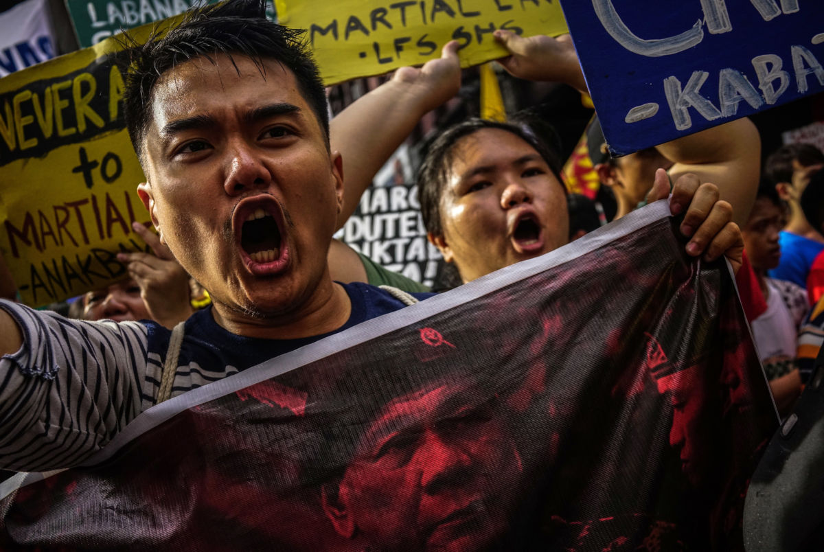 Filipino protesters march against President Rodrigo Duterte on November 30, 2017, in Manila, Philippines.