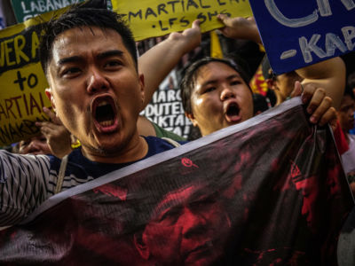 Filipino protesters march against President Rodrigo Duterte on November 30, 2017, in Manila, Philippines.