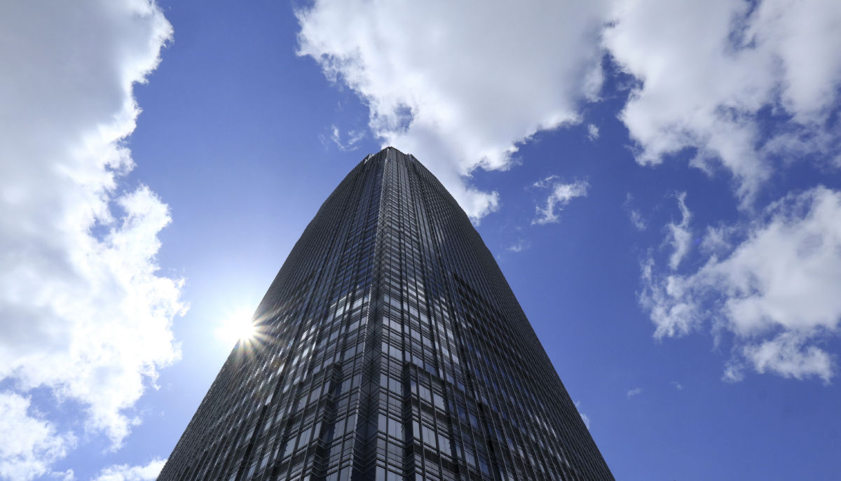 Clouds pass over the Goldman Sachs Tower on April 8, 2018, in Jersey City, New Jersey.