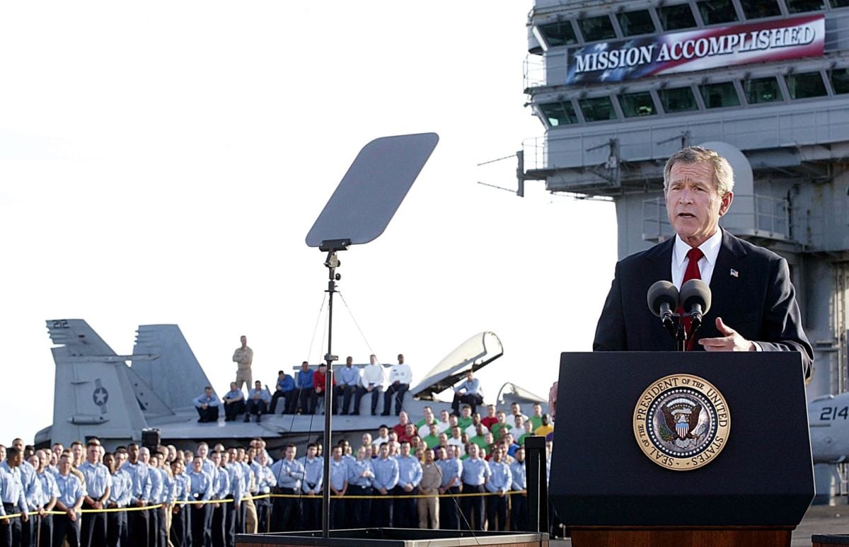 Former President George W. Bush addresses the nation aboard the nuclear aircraft carrier USS Abraham Lincoln 01 on May, 2003, as it sails for Naval Air Station North Island, San Diego, California.