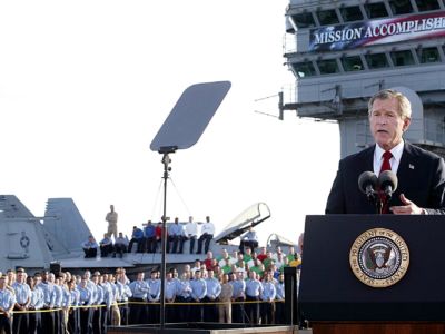 Former President George W. Bush addresses the nation aboard the nuclear aircraft carrier USS Abraham Lincoln 01 on May, 2003, as it sails for Naval Air Station North Island, San Diego, California.