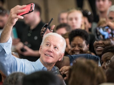 Joe Biden takes a selfie with supporters