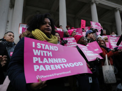 Pro-choice activists, politicians and others associated with Planned Parenthood gather for a news conference and demonstration at City Hall against the Trump administrations title X rule change on February 25, 2019, in New York City.