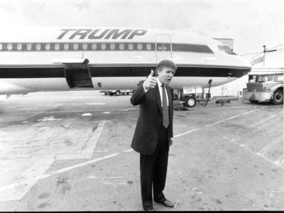 Donald Trump in front of a plane from the failed Trump Shuttle airline, September 13, 1989.﻿