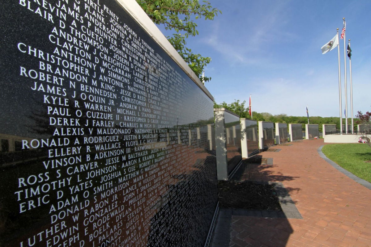 The Middle East Conflicts Wall Memorial in Marseilles, Illinois, consists of polished granite panels listing the names of those killed during various phases of U.S. "forever wars." The panels now contain more than 8,000 names.