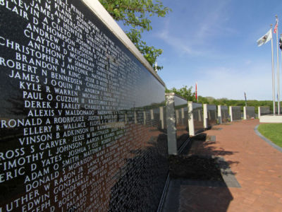 The Middle East Conflicts Wall Memorial in Marseilles, Illinois, consists of polished granite panels listing the names of those killed during various phases of U.S. "forever wars." The panels now contain more than 8,000 names.