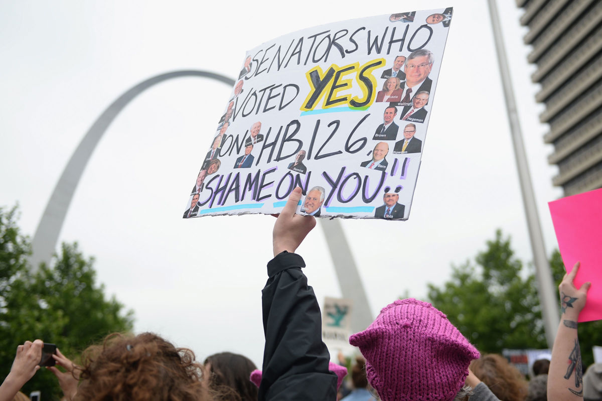 A demonstrator displays a sign during a protest over restrictive abortion laws in St Louis, Missouri.