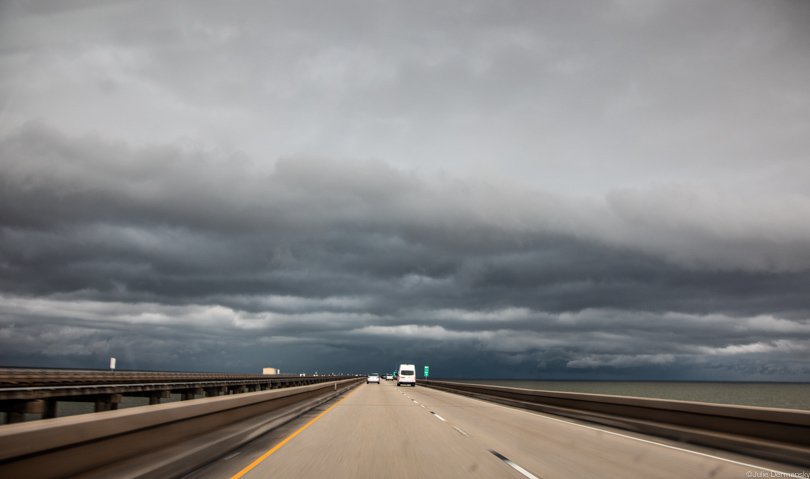 Spring rainclouds over the Causeway Bridge, which spans Lake Pontchartrain and connects New Orleans, on May 9, ushering in a rainy weekend.