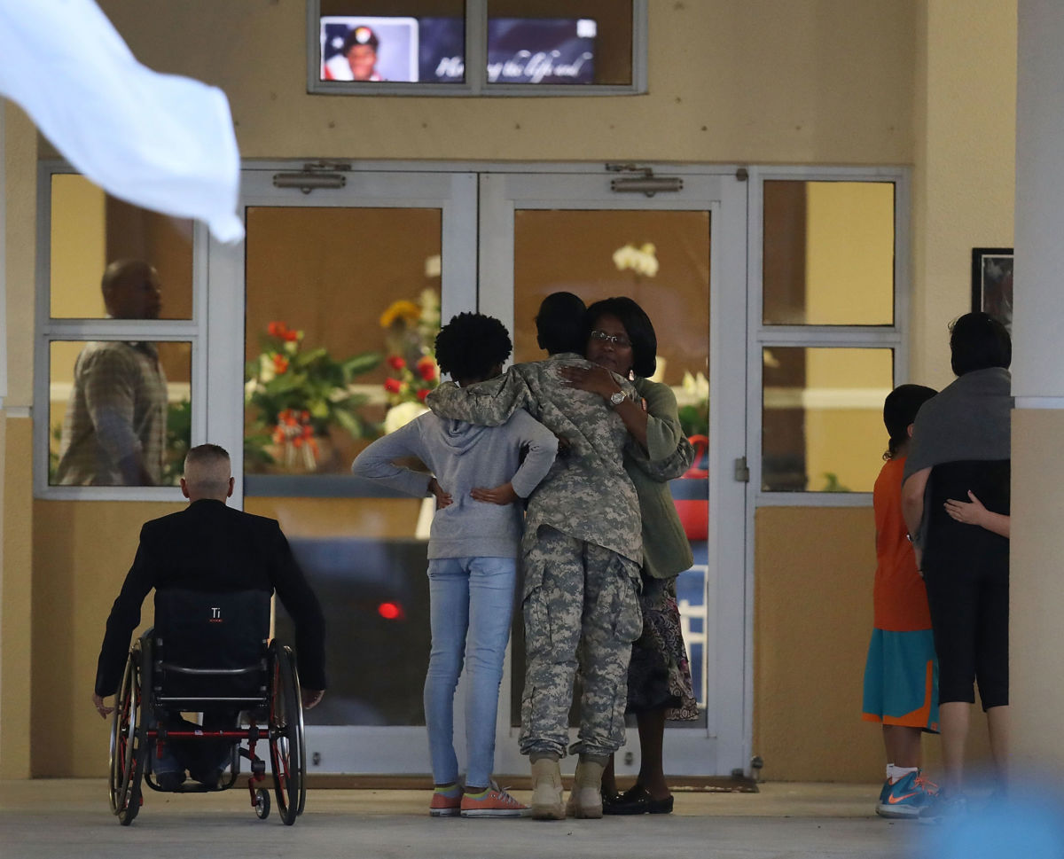 Mourners attend the viewing for U.S. Army Sgt. La David Johnson at the Christ the Rock Community Church