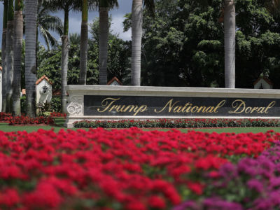 A sign reading Trump National Doral is seen on the grounds of the golf course owned by President Trump on June 1, 2016, in Doral, Florida.