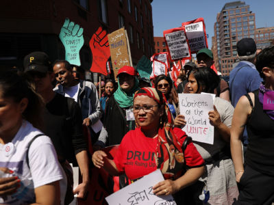 People march in May Day protests on May 1, 2018, in New York City.