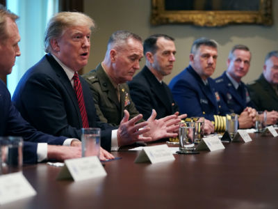 President Trump talks to reporters during a briefing with military leaders
