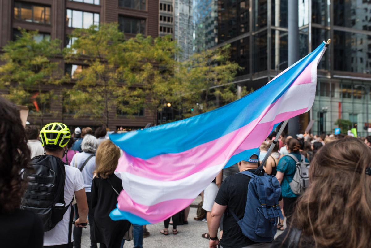 A transgender pride flag waves during a protest in Chicago, Illinois, August 21, 2017.