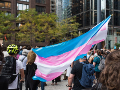 A transgender pride flag waves during a protest in Chicago, Illinois, August 21, 2017.