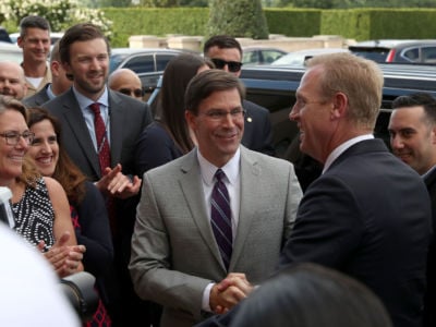 Incoming Acting Secretary of Defense Mark Esper greets Outgoing Acting Secretary of Defense, Patrick M. Shanahan, on his last day at the Pentagon on June 21, 2019, in Arlington, Virginia.