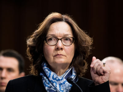 A close up of Gina Haspel's face during a hearing, cia
