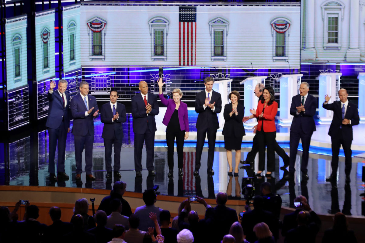 Democratic presidential candidates take the stage during the first night of the Democratic presidential debate on June 26, 2019, in Miami, Florida.