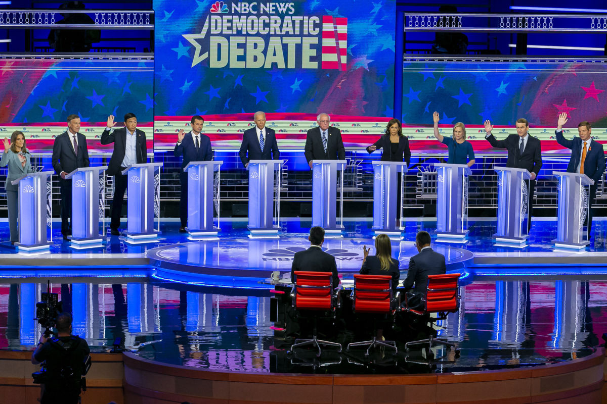 Democratic presidential candidates stand at their podiums during the second dem debate
