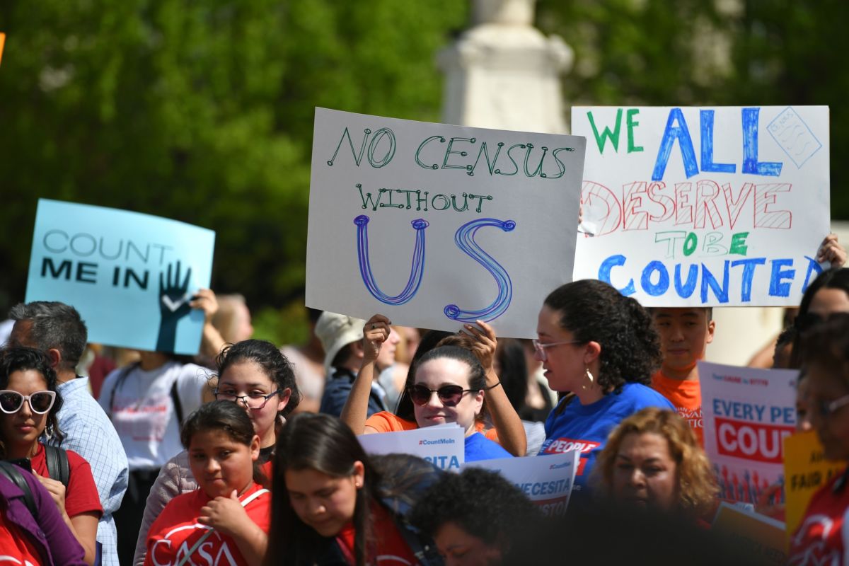 Demonstrators rally at the U.S. Supreme Court in Washington, D.C., on April 23, 2019, to protest a proposal to add a citizenship question in the 2020 Census.
