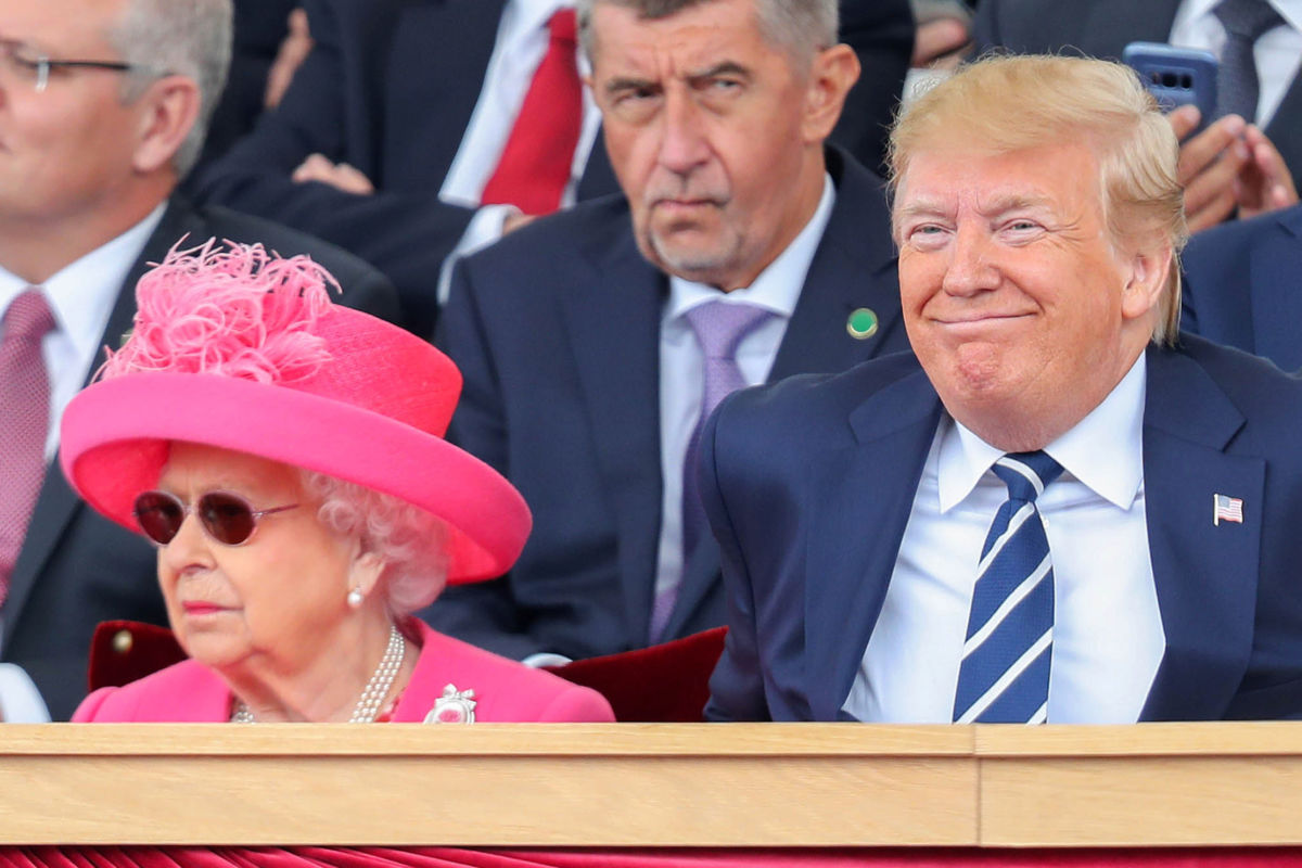 Britain's Queen Elizabeth II (L) sits alongside President Donald Trump during an event to commemorate the 75th anniversary of the D-Day landings, in Portsmouth, southern England, on June 5, 2019.