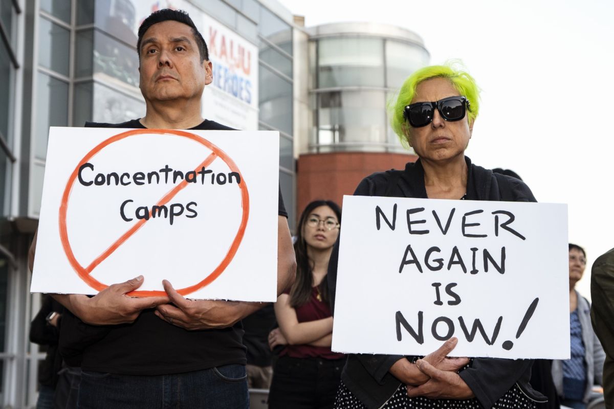 Participants hold placards during a rally in protest of the Trump Administrations plan to use the Fort Sill Army Base as a detention center for immigrant children and other Immigration Customs Enforcement (ICE) detainees in Los Angeles, California.