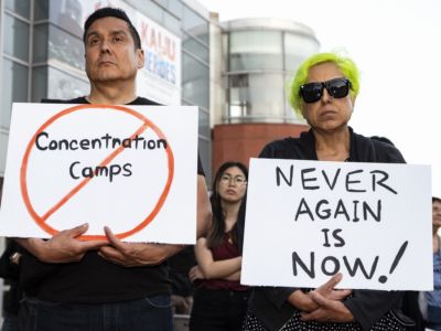 Participants hold placards during a rally in protest of the Trump Administrations plan to use the Fort Sill Army Base as a detention center for immigrant children and other Immigration Customs Enforcement (ICE) detainees in Los Angeles, California.