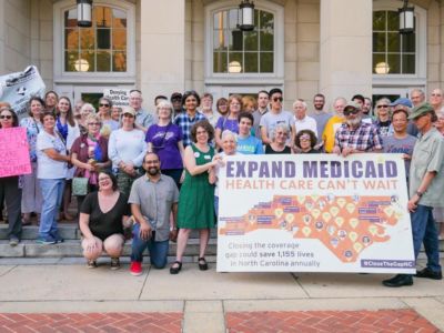 At a recent vigil in Chapel Hill, North Carolina, activists urged the state legislature to expand Medicaid.