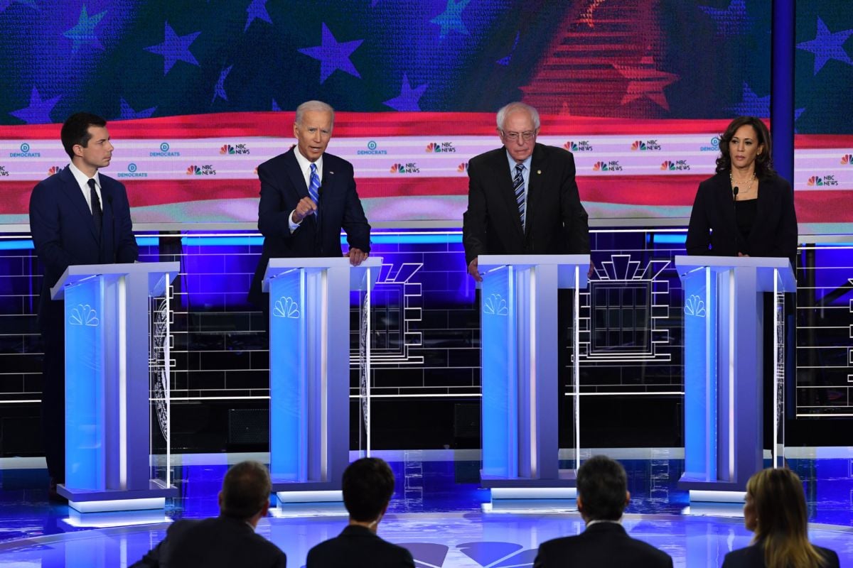 From left to right: Pete Buttigieg, Joe Biden, Bernie Sanders and Kamala Harris stand at their podiums during the second presidential debate