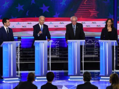 From left to right: Pete Buttigieg, Joe Biden, Bernie Sanders and Kamala Harris stand at their podiums during the second presidential debate