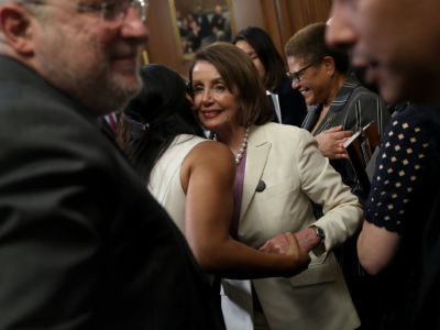 Nancy Pelosi greets young students impacted by immigration issues