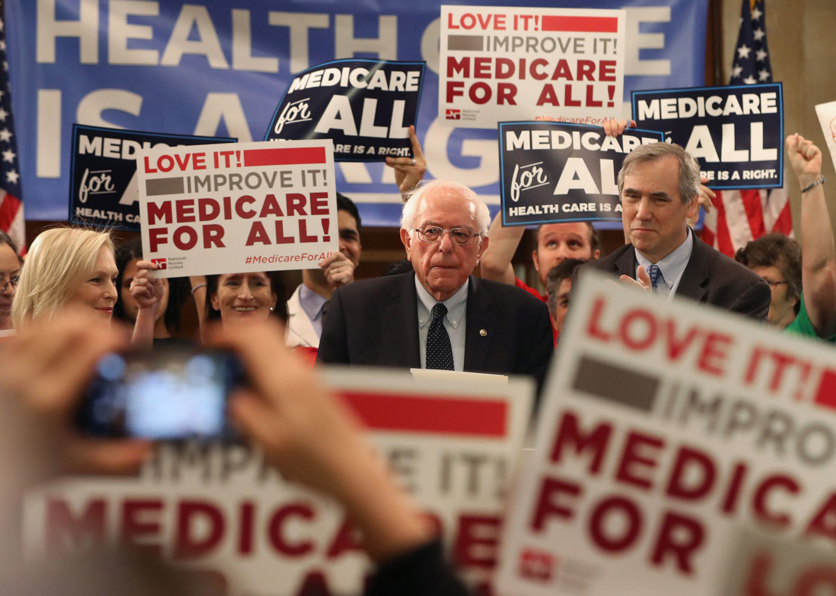 Sen. Bernie Sanders speaks while introducing the Medicare for All Act of 2019 with Sen. Kirsten Gillibrand and Sen. Jeff Merkley during a news conference on Capitol Hill, on April 9, 2019, in Washington, D.C.