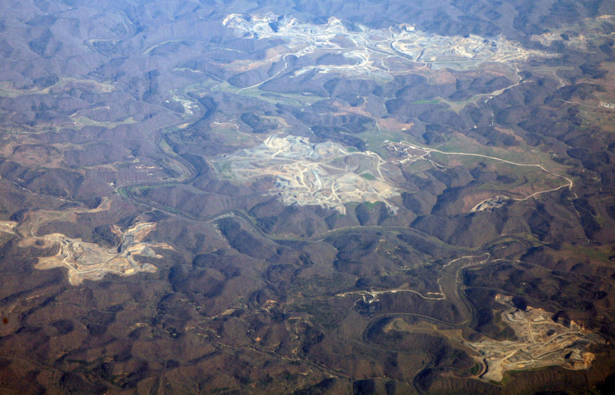 The Bureau of Prisons has for years been proposing to build an 800-acre, maximum security prison on a mountaintop removal site in Kentucky, like one of those pictured above.