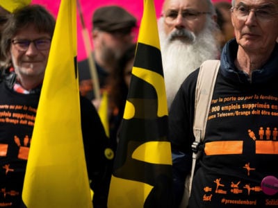 Union members gather in front of a courthouse in Paris on May 6, 2019, on the first day of the trial of several former members of France Telecom's management for "moral harassment," a decade after a wave of suicides occurred at the telecoms giant between 2008 and 2009.