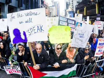 Demonstrators take part in a protest against Islamophobia at Times Square in New York