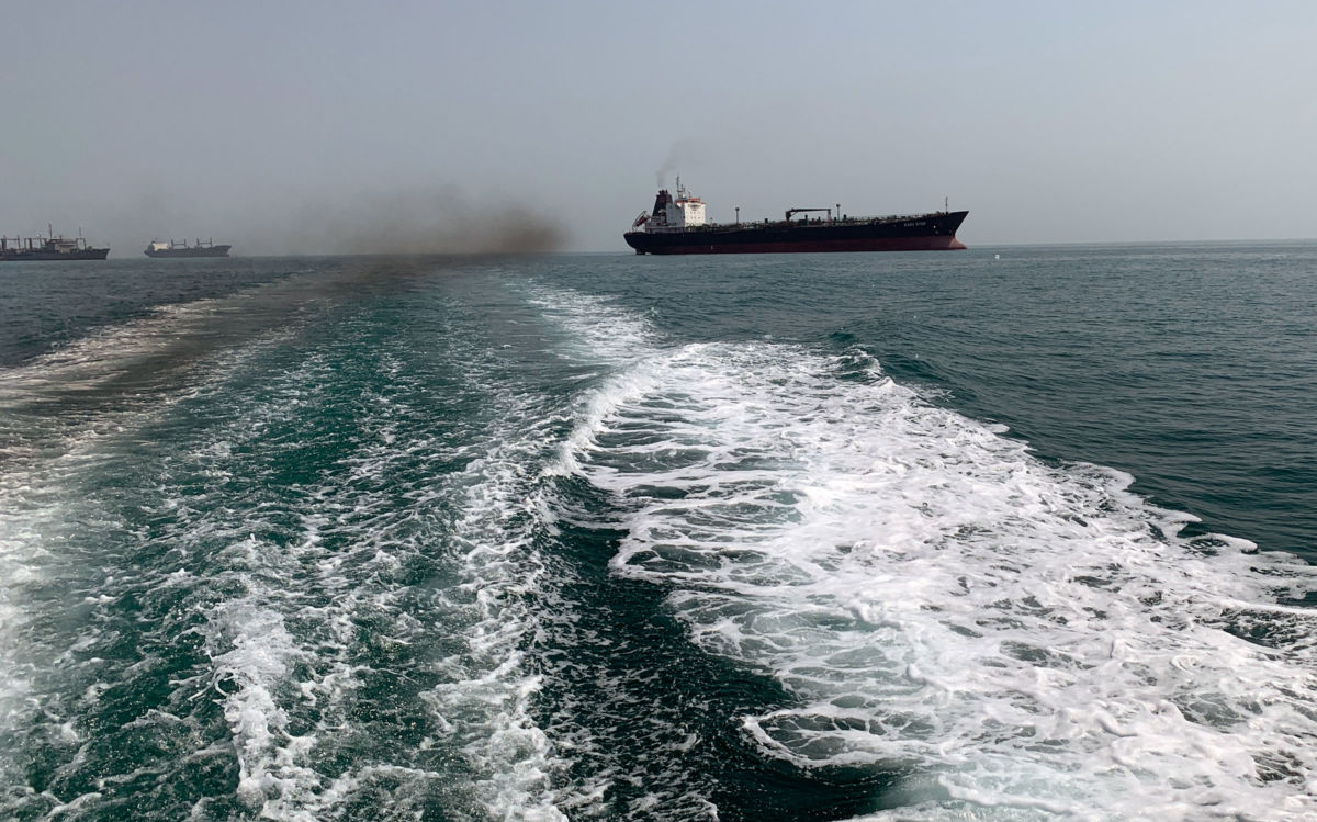 Iranian oil and cargo ships at the Strait of Hormuz. Almost a third of the world's oil exports are shipped through the Strait.