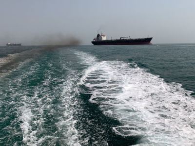 Iranian oil and cargo ships at the Strait of Hormuz. Almost a third of the world's oil exports are shipped through the Strait.