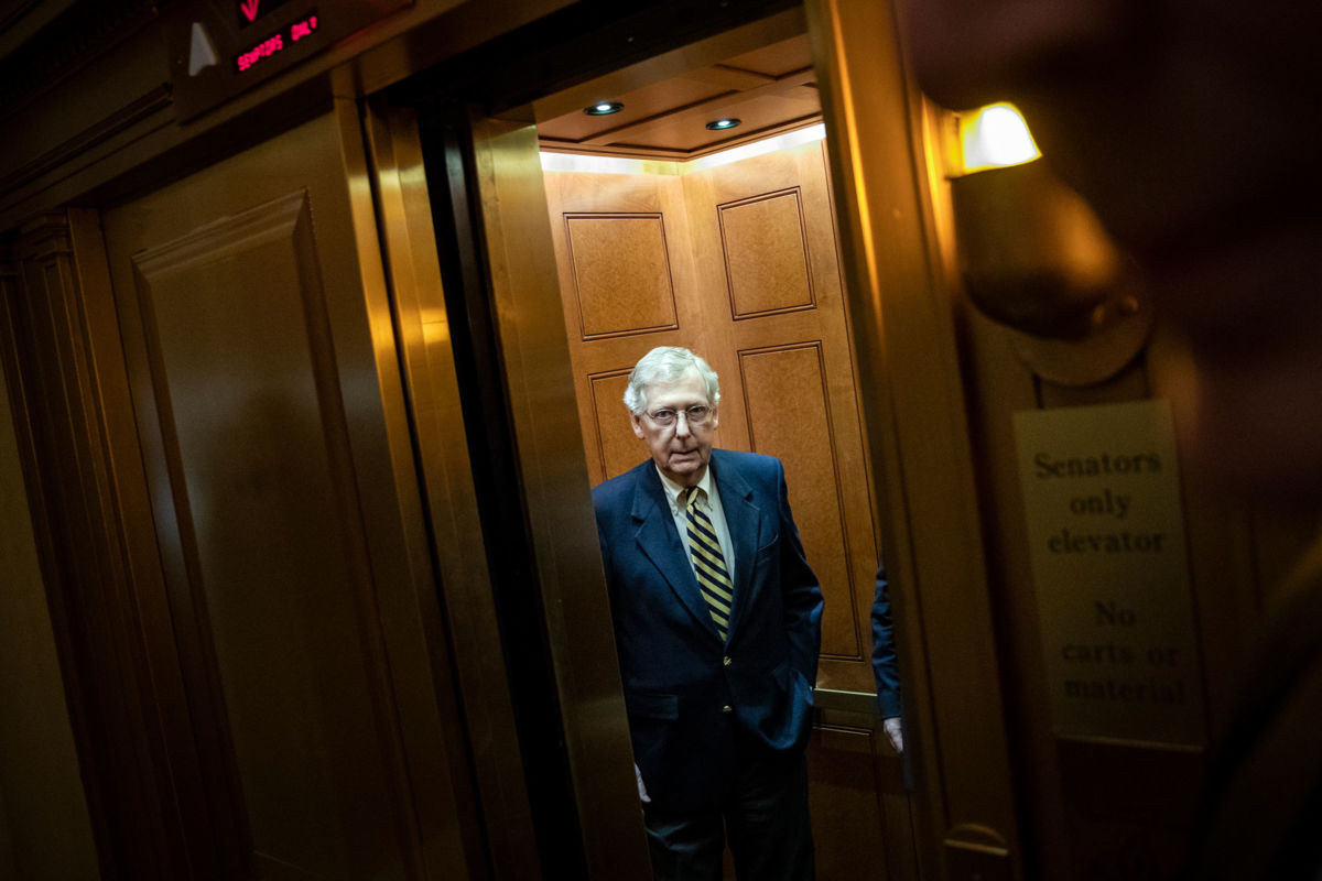 Senate Majority Leader Mitch McConnell gets into an elevator as he leaves his office at the U.S. Capitol, March 25, 2019, in Washington, D.C.