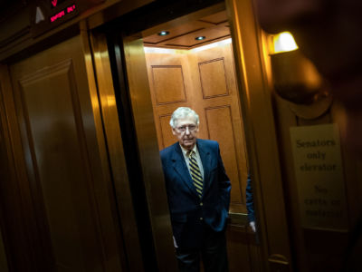 Senate Majority Leader Mitch McConnell gets into an elevator as he leaves his office at the U.S. Capitol, March 25, 2019, in Washington, D.C.